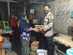 Kapolsek Kota Kisaran Salurkan bantuan Sembako dan Masker