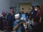 Polsek Kota Kisaran Resor Asahan Gelar Vaksinasi Malam Hari