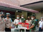 Waka Polres Asahan Tinjau Pelaksanaan Penyaluran BTPKLW di Mako Polsek Simpang Empat