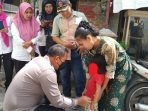Wakapolrestabes Medan Berikan Bantuan Sembako dan Susu Kepada Anak Stunting